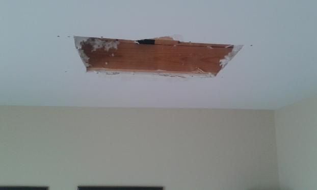 Before a completed sheetrock repair service project in the Nashville, TN area